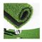 Verde mettente di golf del paesaggio artificiale sintetico residenziale dell'erba